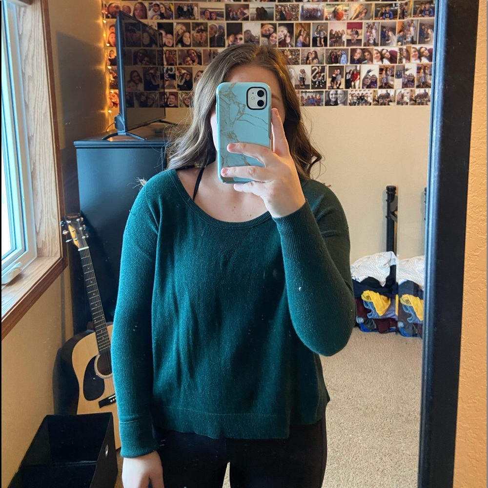 Two blue sweaters